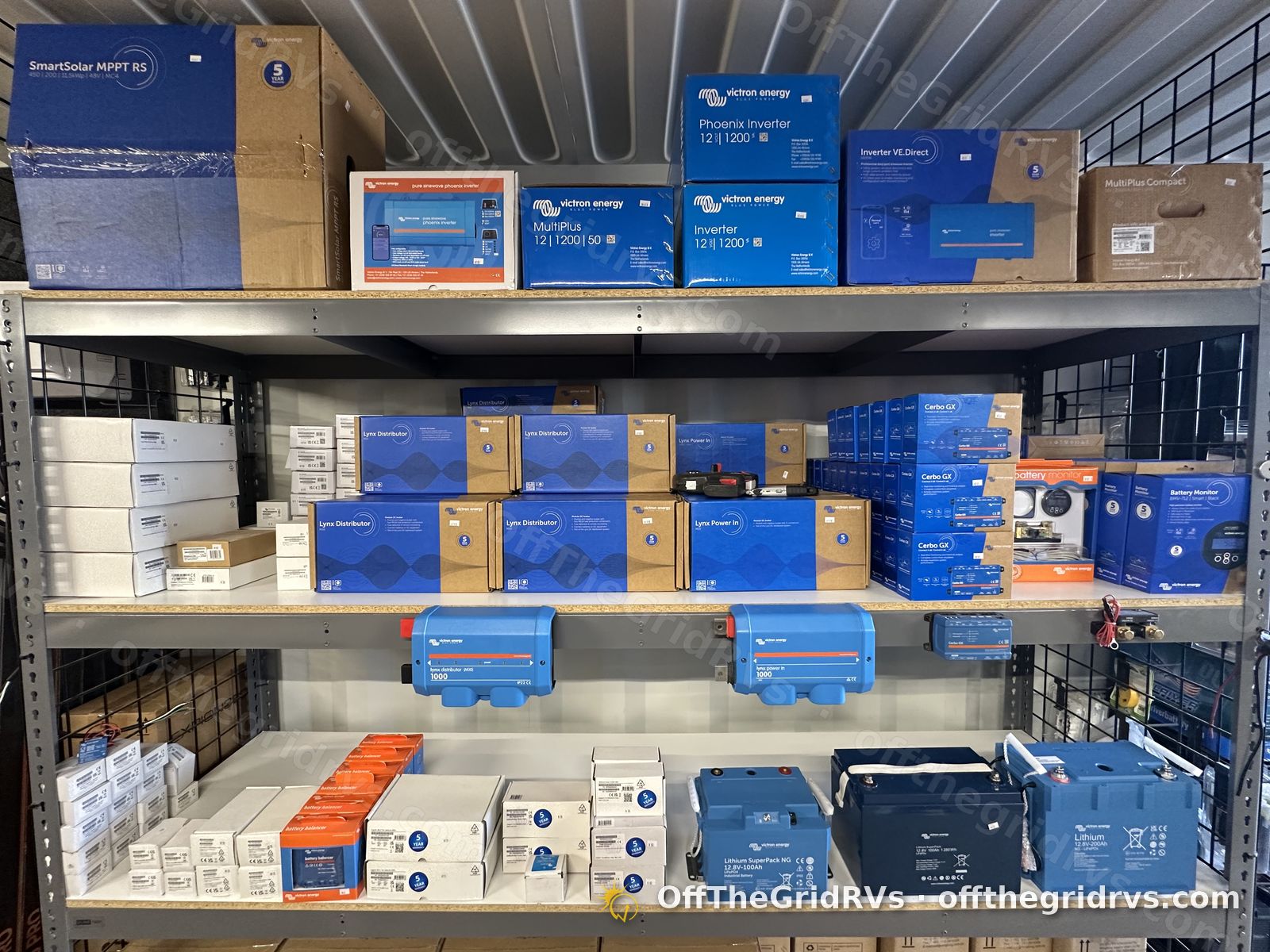 Showroom shelves stocked with Victron Energy SmartSolar MPPT, MultiPlus, Phoenix inverters, Lynx Distributors, Cerbo GX and Lithium batteries